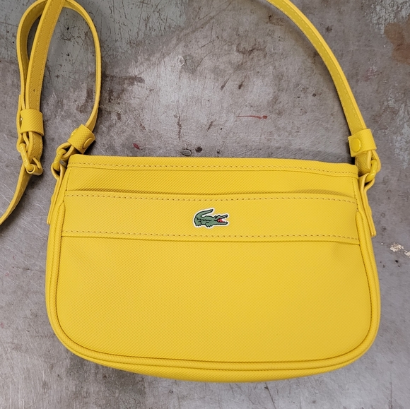 Lacoste Handbags - LACOSTE CROSSBODY PURSE EUC